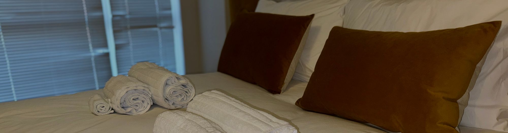 clean towels on crisp sheets